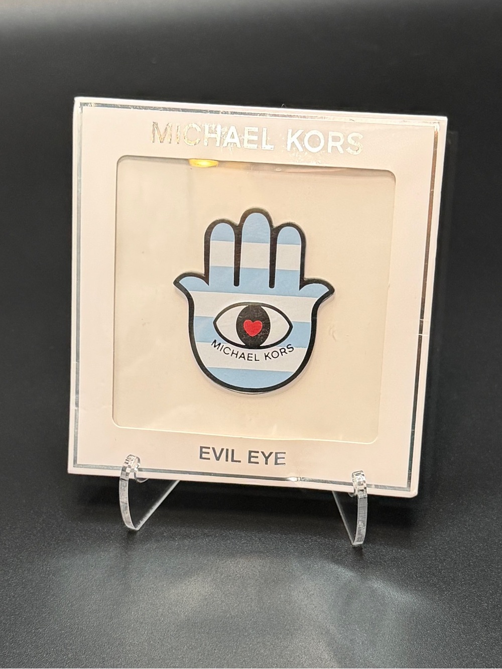 Michael Kors Light Blue Hamsa Evil Eye bag sticker.